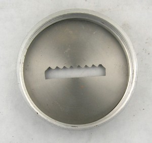 Serrated die in cap